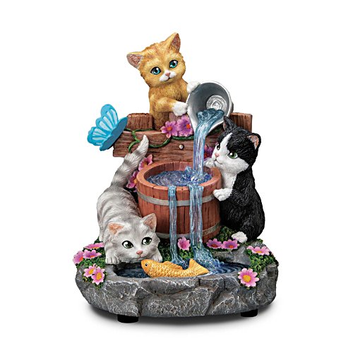 Schnurrhaare und Wasserfälle - Katzenskulptur